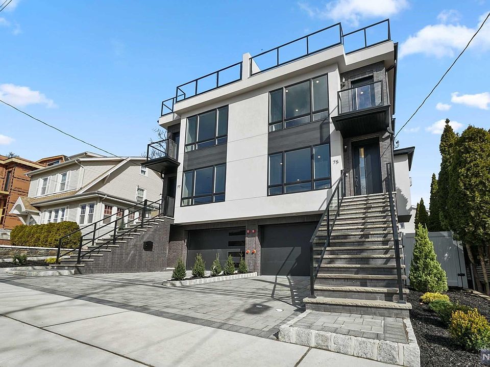 Contemporary multi-level building by Nehme Brother Inc.